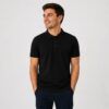Polo unisex Fruit of the Loom negro de manga corta con cuello de canalé y tapeta de botones, ideal para uniformes de trabajo y bordado personalizado.