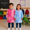 Niños con babis infantiles vichy azul celeste y fucsia para guardería y colegio confeccionados artesanalmente por Unifor Gran