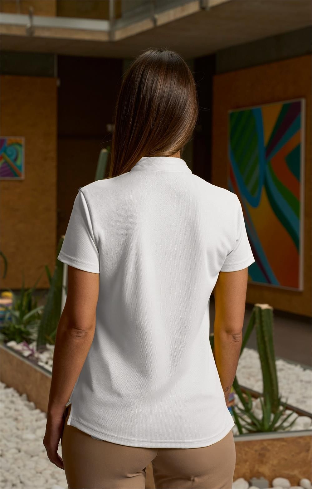 Polo señora cuello mao transpirable con tejido Coolmax en color blanco para uso profesional