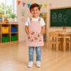 Babi infantil capibara en colores beige y rosa, con tirantes sublimados y tejido Popelín Galaxy de Unifor Gran.